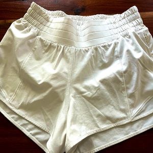 Lululemon size 4 hottie hot shorts 2.5 inch inseam. Mint condition. Bone color